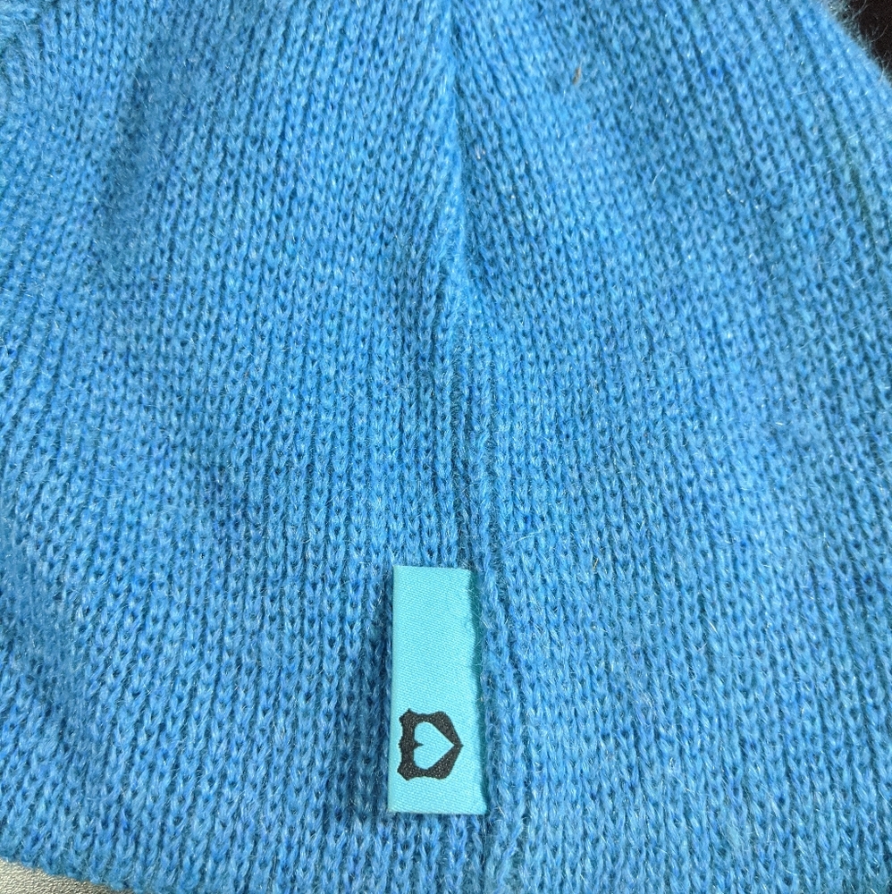 Blue beanie with a heart